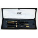 A cased Mont Blanc fountain pen the nib stamped 14K with matching pencil (cased) together with a
