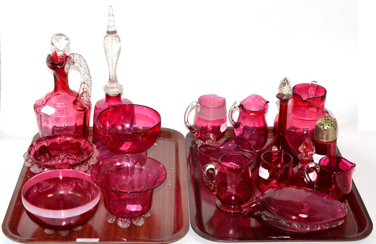 A collection of 19th and 20th century cranberry glassware including a double-ginnel flask; various