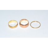 Three 9 carat gold band rings, finger size M1/2, Q and T1/2Gross weight 13.0 grams