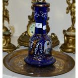 An enamelled blue Persian glass huqqa base and a Persian inlaid brass and white metal tray