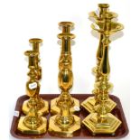 Three pairs of brass candlesticks (6)