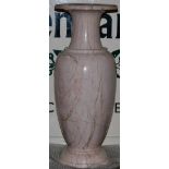 A pink marble baluster vase with flared rim