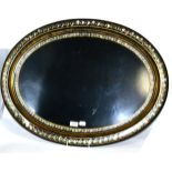 A Victorian papier mache oval tray with mother of pearl border