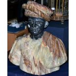 A patinated metal and onyx bust of a Blackamoor