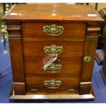 A late Victorian mahogany four drawer chest with lockable stile and key