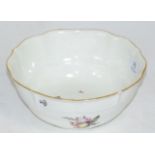 A Meissen porcelain Ogee bowl, circa 1750, painted with flower sprigs within an ozier border,