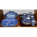A quantity of blue and white old willow pattern etc