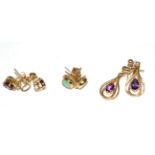 A pair of 9 carat gold cabochon jade earrings; a pair of garnet and diamond drop earrings,