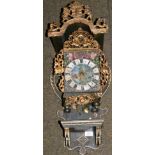 A Dutch thirty hour wall clock, 19th century, gilt painted cast lead pierced frets, polychrome