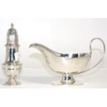 A silver sauce boat and a silver baluster caster