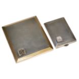 A silver slide action cigarette case with silver gilt border and interior, monogrammed RAS