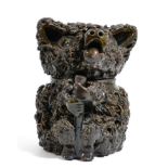 A late 19th/early 20th century tobacco jar in the form of a bear