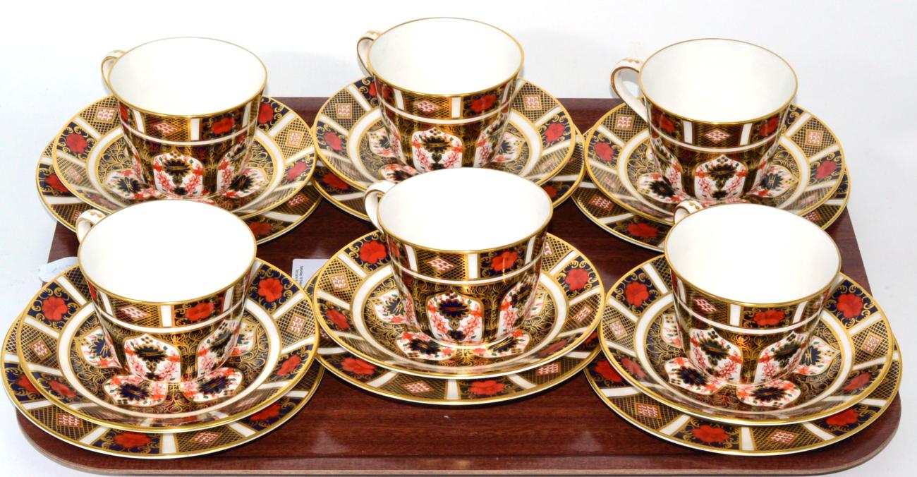 A set of six Royal Crown Derby Imari tea cups, saucers and side plates