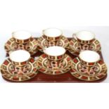 A set of six Royal Crown Derby Imari tea cups, saucers and side plates