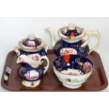 A Victoria and Albert teapot, jug, sucrier and slop bowl