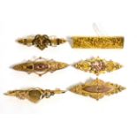 Six Victorian/Edwardian brooches including five 9 carat gold examples (one a.f.), lengths 5cm,