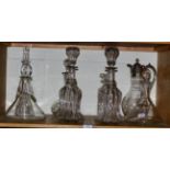 A group of glass decanters, including a pair of plain ship's decanters; a pair of Victorian