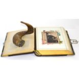 A silver mounted presentation horn snuff mull and a Victorian leather bound photograph album