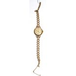 A lady's Tudor wristwatch on a 9 carat gold bracelet strap