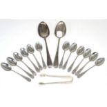 A set of twelve silver teaspoons with bright cut decoration and a matching pair of sugar tongs,