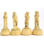 Four 19th century Continental carved ivory figures of gnomes