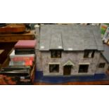 A modern dolls house, front opening with four rooms, and a box of assorted furniture; modern