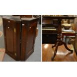 Two George III oak hanging corner cupboards each with ogee panelled doors together with a 19th