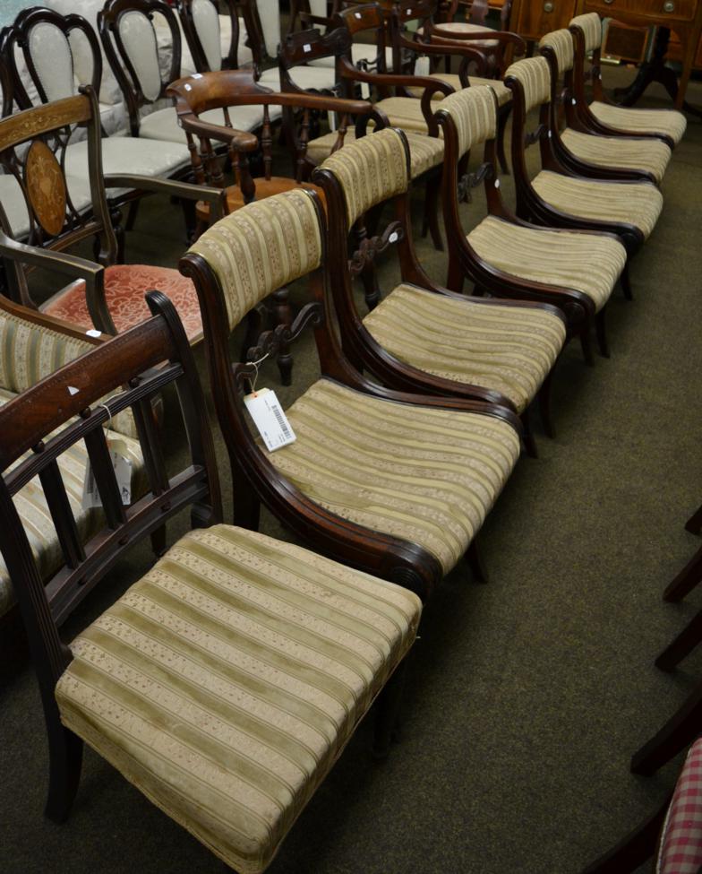 A set of six Regency mahogany dining chairs, together with a similar pair of carvers, and two