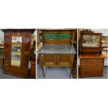 An early 20th century mahogany three piece bedroom suite comprising a marble topped and tile