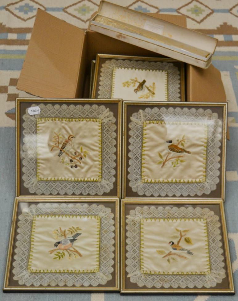 A set of ten framed silk work panels and a lace and mother of pearl fan