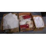 Assorted white linen, cotton cloths, thread, crochet edged cloths and other items (three boxes)