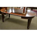 Early 20th century mahogany extending dining table with two leaves raised on square tapering legs