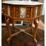 A Peranaken style side table with a marble top