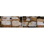 Ten boxes of assorted white linens, embroidered and crochet edged textiles, costume etc