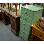 A mahogany pedestal desk (a.f.) and a painted pine six height chest of drawers