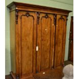 A Victorian mahogany triple wardrobe285cm high by 194cm wide.