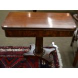 An early 19th century mahogany tea table