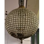 A wirework and lustre globe form ceiling light