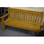 A well made oak slatted garden bench