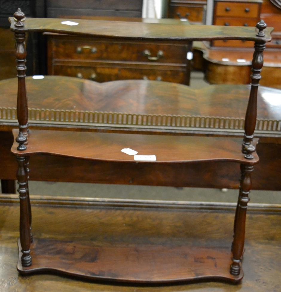 A set of mahogany shelves