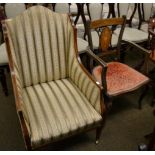 A mahogany framed bergere chair, one leg stamped C.VS; together with an inlaid chair