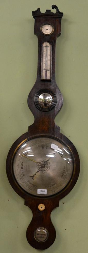 A 19th century rosewood wheel barometer with silvered dial