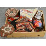 A box of assorted Tibetan and Arabian headdresses in turquoise and coral