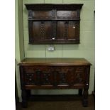 Carved oak chest in the 17th century style, with fall front; together with a carved oak panel