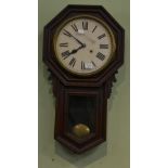 An oak cased striking drop dial wall clock