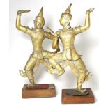 Two gilt metal South East Asian figures of dancing warriors