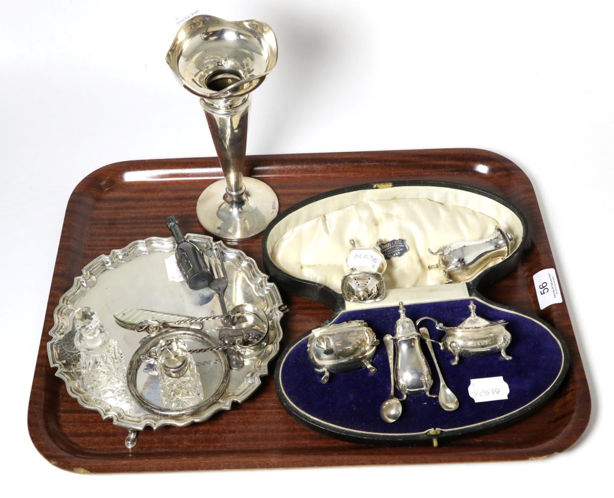 A small shaped circular silver salver; together with an assortment of silver and other items