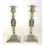 A pair of Victorian electroplated candlesticks, James Dixon & Sons, of George III influence with