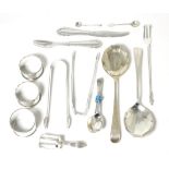 A mixed group of silver items including napkin rings; sugar tongs; Georg Jensen knife and fork;