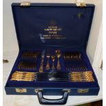 A West German gold plated table service in a blue briefcase canteen